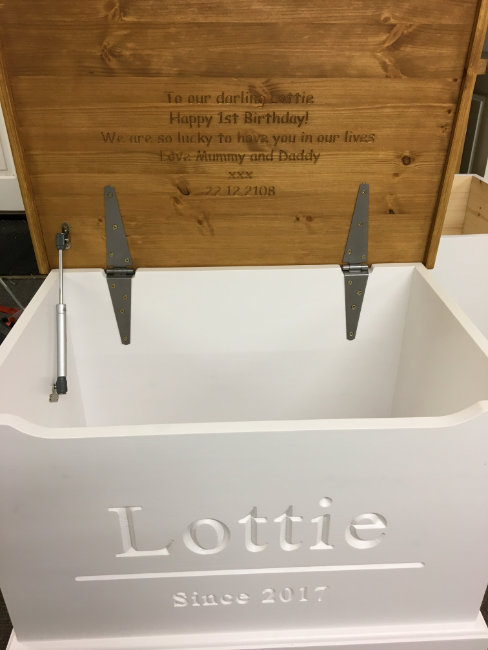 Message under toy box lid