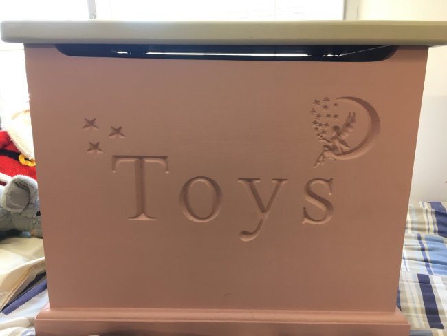 Pink coloured toy box